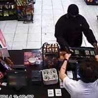 <p>Police are seeking help identifying the suspects in this photos, who robbed a gas station at gunpoint Tuesday.</p>