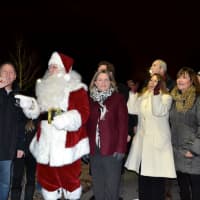 <p>Lights -- and action! Westchester County Executive Rob Astorino -- with Santa by his side -- officially starts the Kensico Winter Wonderland.</p>