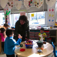<p>Lowey visits with the students at the school.</p>