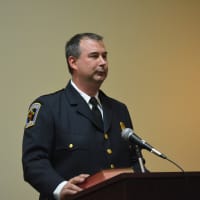 <p>Joseph Spinelli, Mount Kisco&#x27;s new police chief, speaks at a Village Board of Trustees meeting.</p>
