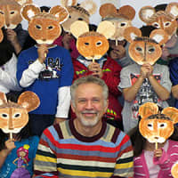 <p>Daniel Kirk and the students after they created their &quot;Library Mouse&quot; masks.</p>