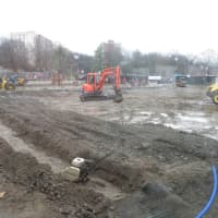 <p>Bulldozer crews worked feverishly on Wednesday to level off tennis court areas expected to open next month at Delfino Park.</p>