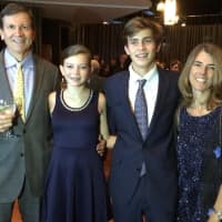 <p>Dawn Edgar, second from left, stands with her parents, Pat, left, and Dawn, right, and brother Sean at an Arthritis Foundation dinner in November.</p>