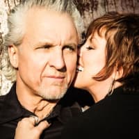<p>Pat Benatar gives husband-guitarist Neil Giraldo her best shot. Their Capitol Theatre concert set for Friday is likely to be postponed for a second time.</p>