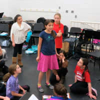 <p>Students rehearse for the performances.</p>