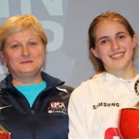 <p>Coach Anya Katkova, left, and Sylvie Binder, of Armonk</p>