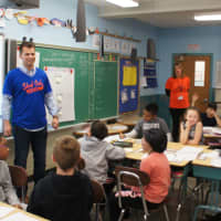 <p>Baseball player Joe Panik talks pupils at George Washington Elementary.</p>