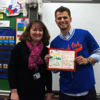 <p>Joe Panik holds his poem from when he was a student at George Washington Elementary.</p>