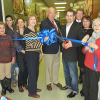 <p>Mount Kisco Mayor Michael Cindrich, center, with Shane  Furnia, right, at Hudson Valley Olive Oil ribbon cutting.</p>