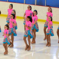 <p>Girls on the Shimmers perform their routine to the Cruisin for a Bruisin theme song from Teen Beach Movie.</p>