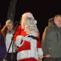 <p>Santa and Lewisboro Supervisor Peter Parsons, second from right, on stage at the town&#x27;s holiday celebration.</p>