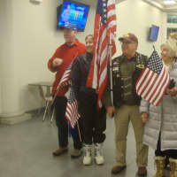 <p>Supporters greet the truck drivers, state troopers and volunteers as they come in to the service plaza in Darien.</p>