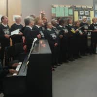 <p>The Serendipity Chorale sings &quot;We Shall Overcome,&quot; one of the many songs performed at the International Human Rights Day celebration.</p>