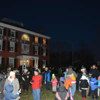 <p>Folks gathered outside of the Elephant Hotel in Somers for the town&#x27;s holiday celebration.</p>