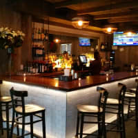 <p>The bar at The Chelsea will warm you up before you even order a drink.</p>