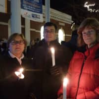 <p>Greenwich residents, from left Judy and Peter Berg and Phyllis Behlen, attend the Stamford Vigil of Hope on Thursday evening to prevent gun violence.</p>