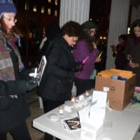 <p>About 60 people attend the Stamford Vigil of Hope on Thursday evening to prevent gun violence. It was held in front of the Ferguson Library.</p>