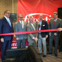 <p>Norwalk Mayor Harry Rilling joins Frontier Communications for its ribbon-cutting at 2 Washington St. See story for photo IDs.</p>