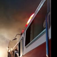<p>Dobbs Ferry firefighters battle the blaze.</p>