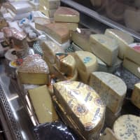<p>All of the cheeses offered at the Greenwich Cheese Company are sliced per order from large wheels. </p>