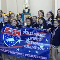 <p>The Weston Trojan cheerleaders celebrate after winning the American Youth Football national championship.</p>