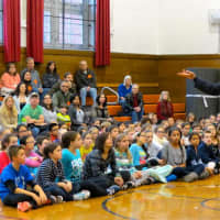 <p>Croton-on-Hudson retired Detective Cliff Gabrielsen reviewed the D.A.R.E. program with Pierre Van Cortlandt Middle School sixth-graders and their parents.</p>
