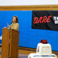 <p>Croton Community Coalition Chairwoman Laurie Dean spoke with parents about maintaining a drug-free community at the Pierre Van Cortlandt Middle School sixth-grade D.A.R.E. graduation.</p>