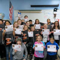 <p>Sixth-grade students at Pierre Van Cortlandt Middle School in Croton-Harmon received certificates for completing the D.A.R.E. program  a collaboration between the school, Croton-on-Hudson Police Department and Croton Community Coalition.</p>