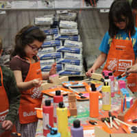 <p>The Home Depot menorah workshop attracted dozens of local children.</p>