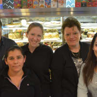 <p>Olympic Diner owner Nick Tsakonitis, with his wife, Veronica, and three staff members.</p>