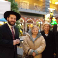<p>Rabbi Mendy Hurwitz, Sheila Stern, NYS Assembywoman Shelley Mayer,former Yonkers City Council President Chuck Lesnick and Ridge Hill General Manager Andrew Hardy gather for a photo op before the menorah lighting. </p>