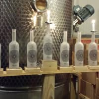 <p>This menorah was made from bottles from Nahmias Et Fils Distillery.</p>