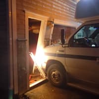 <p>A van crashed into the garage door of a house on Terhune Drive Wednesday afternoon.</p>