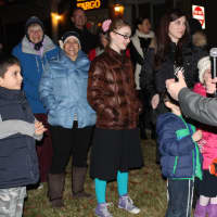 <p>Rabbi Yehoshua S. Hecht, of Beth Israel Synagogue, speaks to a group of children about the message of Hanukkah in Westport.</p>