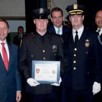 <p>Briarcliff Police Chief Norman Campion with his son, Michael, a new Mount Vernon police officer.
 
Commissioner Frank Resigno of Elmsford with son Paul
 
Photo of County Exec Astorino addressing the grads
 
T</p>