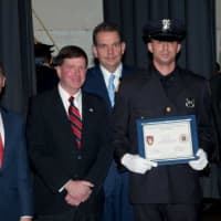 <p>Elmsford Police Commissioner Frank Rescigno, far right, with new son, Paul.</p>