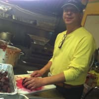 <p>John Weintraub, of Brooklyn, N.Y.-based Avanti Specialty Foods, prepares beets for the holiday dinner at the Stamford Boys &amp; Girls Club Friday.</p>