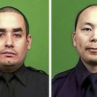 <p>Slain NYPD officers Rafael Ramos and Wenjian Liu.</p>