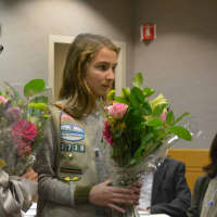 <p>Local Girl Scouts with flowers for Henriette Suhr.</p>