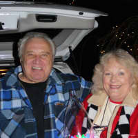 <p>Rick &amp; Joan Setti of Norwalk show off their trophy from ABCs &#x27;Great Christmas Light Fight.&#x27; They also won the $50,000 top prize. </p>