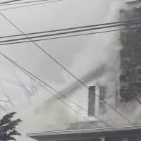 <p>Firefighters are on Angela Drive fighting a house fire. </p>