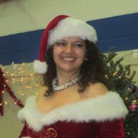<p>One of Santa&#x27;s helpers at the annual holiday dinner in Katonah.</p>