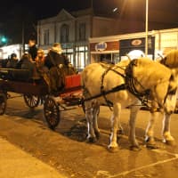 <p>Horse-drawn carriages offer rides to revelers at the Westport Weston First Night.</p>