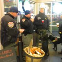 <p>Westchester County police and their dogs warmed up briefly at Starbucks before the New Year&#x27;s celebration.</p>