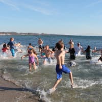 <p>Participants hit the 41-degree water on Thursday morning at Compo. </p>