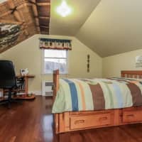 <p>There are two bedrooms on the first floor and two more on the second floor.</p>