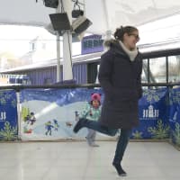 <p>Lily Schlafman and mom, Julie, of New Canaan, try sock skating at Stepping Stones Museum for Children.</p>