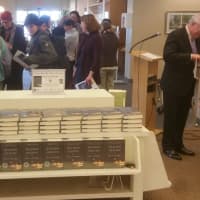 <p>Many were on hand, Thursday, for the unveiling of this year&#x27;s selection for One Book One Town, including First Selectman Michael Tetreau.</p>