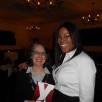 <p>Francine Lucidon, owner of The Voracious Reader, left, with author Ilyasah Al-Shabazz.</p>