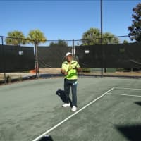 <p>Hutcherson in action on the tennis court.</p>